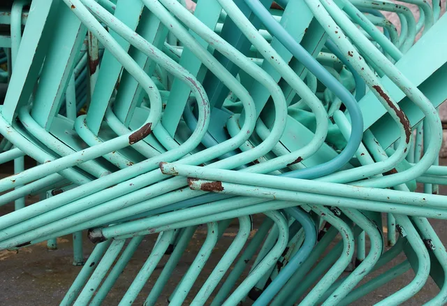 portugal, lisbon, almada, chair, stack, stacked, pattern, furniture, seat, metal, worn, rusty, colorful. Barcode vs RFID for Party Rental Inventory: What Pays Off at 500 Items