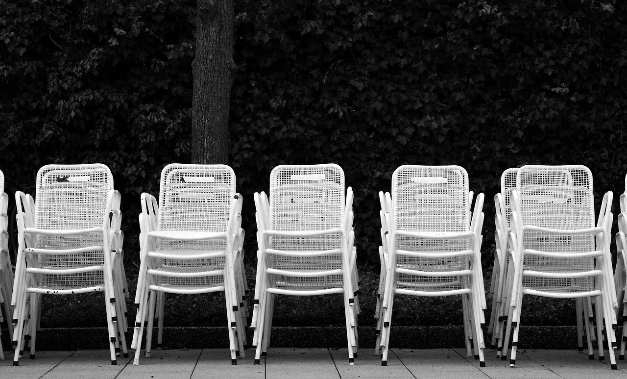 chair series, metal chairs, monochrome, black-and-white, stacked, break, place to wait, waiting room, seats, chair, seat, empty, seating, rows of seats. New vs used party rental equipment: a worked example and buying rules