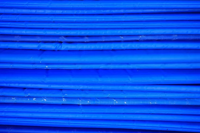 mats, blue, lying mats, material, deck chair cushions, pads, deck chair mats, stack, stacked, sorted, cleaned up, pile of mats. 6 habits keep party rental stock control honest all season