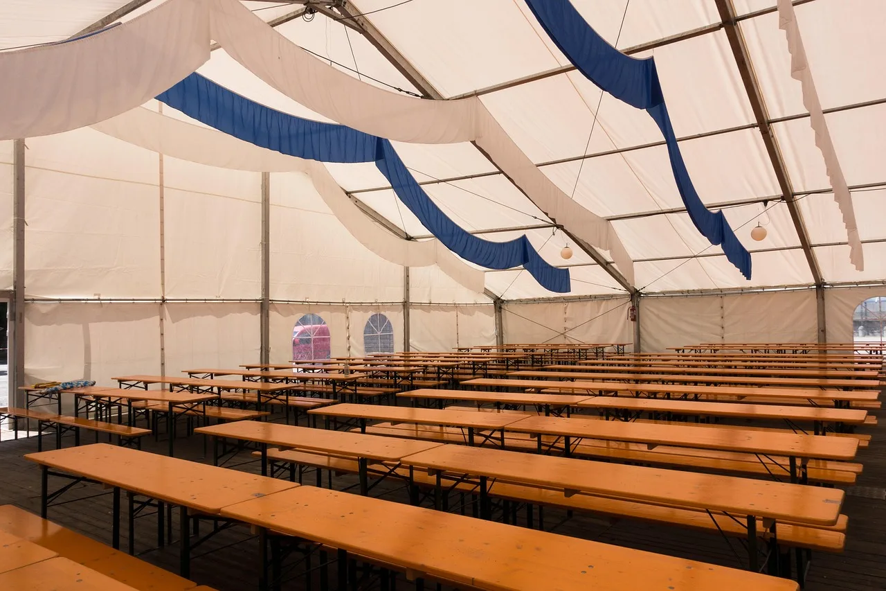 fixed, beer tent, tradition, bavaria, gastronomy, time, table, event, to celebrate, marquee, bavarian, summer, beer bank, nature, drink, banner, white, blue. Party Rental Tent Installation: Wind Ratings and Fire Code by State
